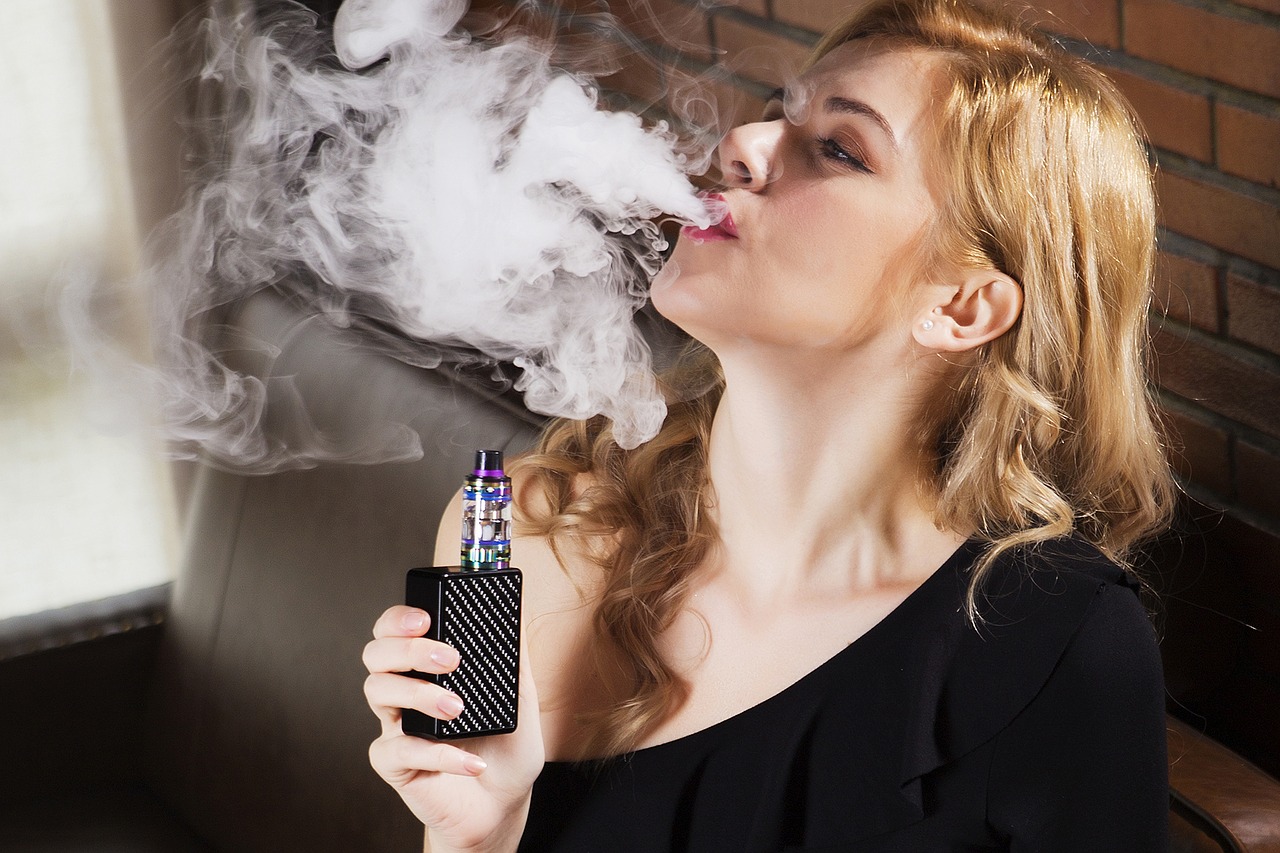 girl with a vape